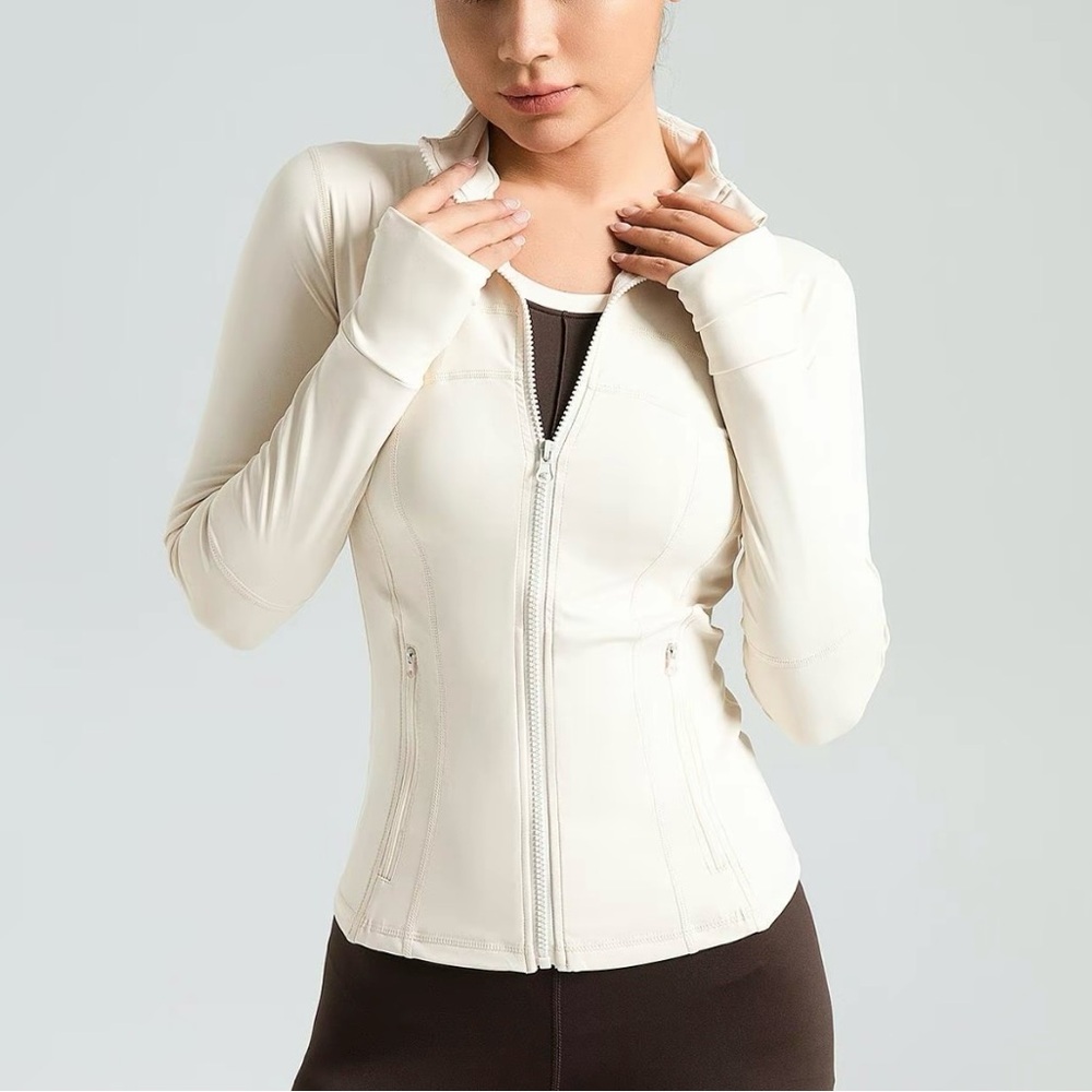 White zip up sports jacket